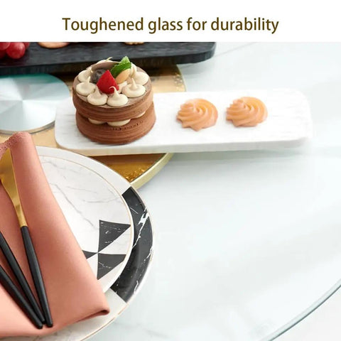 Super Spacious 40 Inch Lazy Susan Turntable For Kitchen Tables Crafted From Tough Tempered Glass with a cake and decorative sweets.