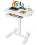 Adjustable Height Rolling Desk With Drawer Swivel Casters Mobile Standing Workstation with laptop and cup on a white top.