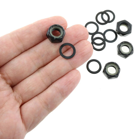 Hand holding washers and nuts from Two Sets Black Imperial Hex M8 Skateboard Side Nut Washers With Non Slip Rubber Ring Built Tough
