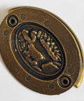 Oval plate with deer pattern from 4-Pack Vintage Style Antique Brass Deer Pattern Bail Drawer Pulls, 2-Inch Center-To-Center, 51mm.