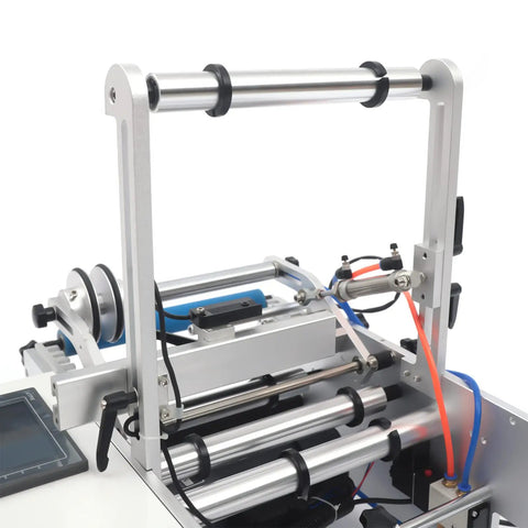 Semi Automatic Round Bottle Labeling Machine High Speed 300W Fiber Optic Sensor Auto Detect close-up view of rollers and sensors.