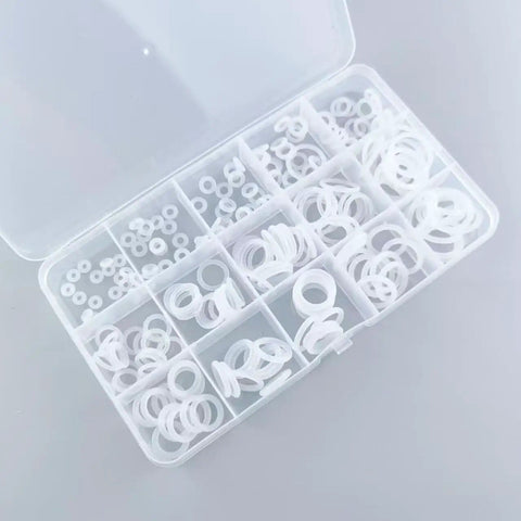 Clear box displaying Must Have 225 Piece Silicone O Ring Assortment Kit for automotive plumbing and faucet repairs with 15 different sizes.