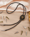 12 Piece Alloy Bolo Tie Cord End Caps Set in Three Colors, Vintage Cowboy Style Tips, 3 cm Long With 4 mm Inner Diameter for DIY Jewelry Making, Necklaces, Neckties, and Craft End Caps. Alloy bolo tie cord ends on black braided cord