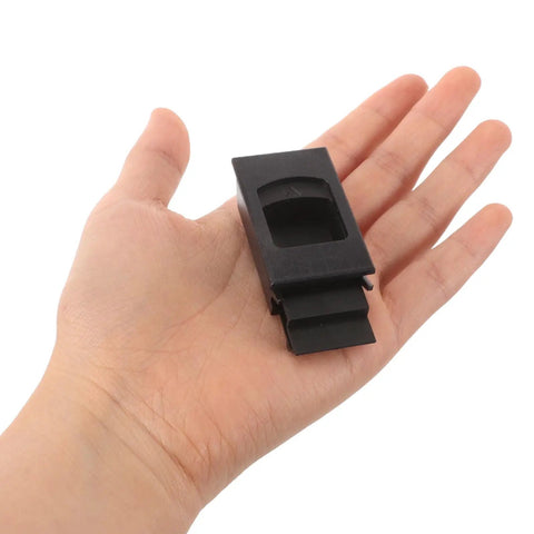 Hand holding a rectangular latch from the 4 Pack Plastic Latch Lock For Distribution Boxes And RV Doors, black hardware shown.