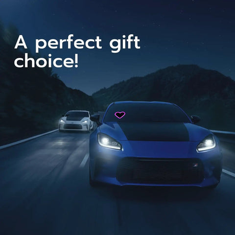 Heart Shaped Car LED Ambient Light With Solar Rechargeable Power, Six Cool Lighting Modes, glowing on a car windshield at night