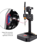 Front view of black vertical heat-set insert tool with orange controls and 90W soldering iron on stand; inset close-up of eccentric nut