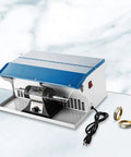 200W Jewelry Polishing Machine Desktop Buffing Tool With Light 110V 0 To 10000 RPM beside rings on marble surface