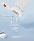 Rechargeable Electric Kettle And 316 Stainless Steel Travel Mug With 500ml Quick Boil pouring water into a clear measuring jar.