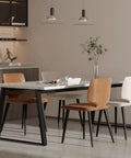 Heavy Duty Metal Table Legs With Adjustable Feet Matte Black Industrial Desk Base And Bench Supports For DIY Furniture Builds shown with modern chairs.