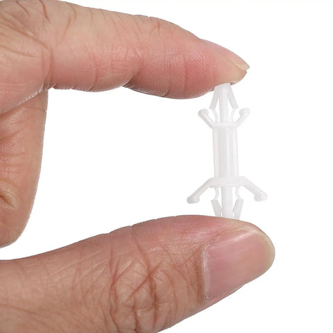 Top Shelf 60 Pack Nylon PCB Standoffs With Snap Tight Reverse Locking Clamps 12.9 mm height held in hand for secure installation.