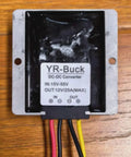Beefy 15V To 12V Buck Converter For 24V 36V 48V Power Systems on wooden surface
