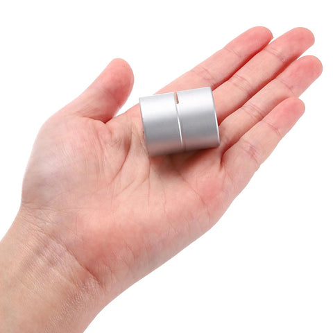 Rock Solid Aluminum Shaft Coupler For 10 To 12.7 mm ID And 30 mm Length in hand view showcasing size and material.
