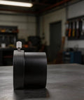 2 Inch Telescope Adapter For C Series And 8SE, Aluminum Alloy Build, black, side view on workshop table.