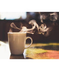 Hot steaming coffee in a white mug on a countertop, showcasing comfort with Premium Replacement Water Filter Cartridges Compatible With Wmf 800 900 And 1000 Coffee Makers High Grade Six Pack Hit Different Clean Filtration Keeps Your Daily Grind On Point Stress Free Operation Forever.