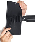Back view of black solar panel being mounted, 360-degree mount shown, part of Solar Panel For Wyze Cam Outdoor With 2W 5V Charging Kit
