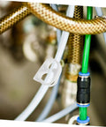 20 Pieces Flow Control Clamps For Lab Water Hose Tubing Pinch Valves and Tube Clips displayed on green and braided tubes