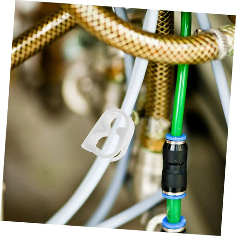 20 Pieces Flow Control Clamps For Lab Water Hose Tubing Pinch Valves and Tube Clips displayed on green and braided tubes