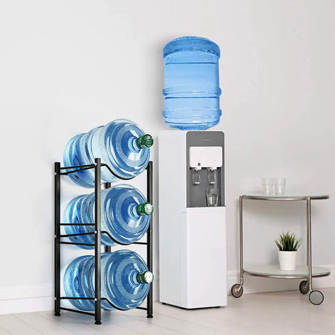 5 Gallon Water Jug Rack Heavy Duty 3 Tier Stackable Water Bottle Holder in black steel with jugs in kitchen