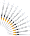 Premium 100 Pack 1Ml Luer Lock Syringes With 25Gauge Needles, Heavy Duty Industrial Disposables shown in a fan arrangement.