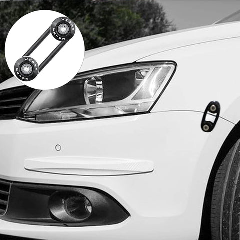 Universal Car Bumper Quick Release Kit with 4 black release tabs on white car, close-up of front bumper and headlight.