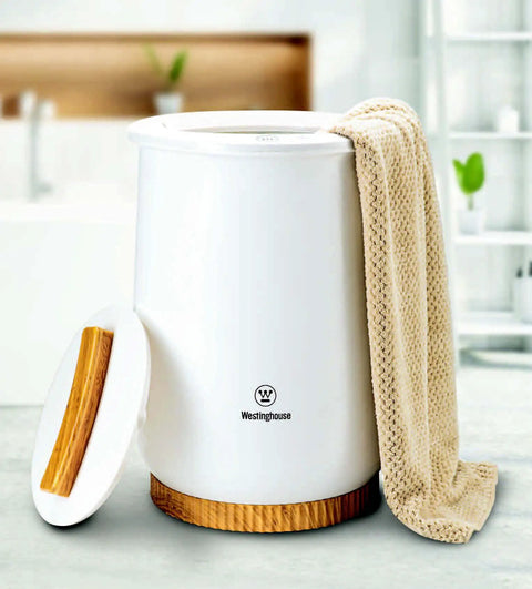 Bucket Style Towel Warmer in bathroom, holding towel on side, with lid on floor, fits two 40x70 towels, rapid heat, auto shut off.