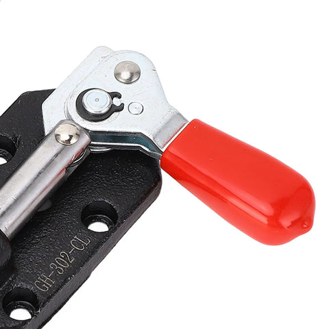 Close-up of Rock Solid Two Pack Push Pull Toggle Clamps Built From Heavy Duty Cast Iron with a red handle, ideal for woodworking.