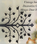 Kick Ass Wrought Iron Door Hinges With Glossy Black Powder Coating decorative gate hinge showcasing floral design for farmhouse use.