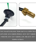 Close-up of a trunk switch compatible with Subaru models, showcasing electrical connector and plug for tailgate release.