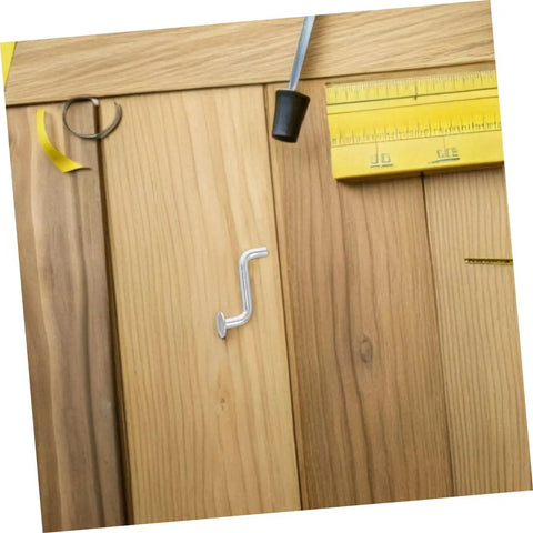 Heavy Duty 30 Pack Pallet Rack Safety Pins And Bolt Locking Clips To Keep Warehouse Shelving Rock Solid And Secure For Industrial Storage And Shop Floor Lockdown on wooden surface with measuring tape.