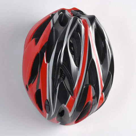 Red and black bicycle helmet with aerodynamic design and ventilation openings