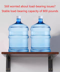 Heavy Duty Metal Shelf Brackets For Wall Mount Storage with two water bottles on a wooden shelf, showcasing sturdy support.