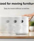 White appliance on countertop with 8 Pack Self Adhesive Appliance Sliders With 360 Degree Swivel Mini Caster Wheels in motion