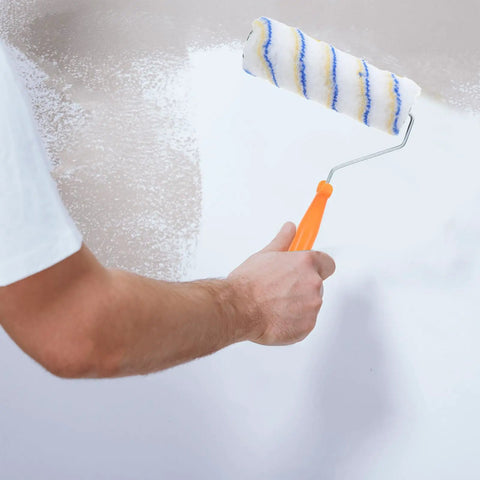 Set Of 3 Pro Grade Paint Rollers For Walls And House Painting with smooth even coverage applied on a wall.