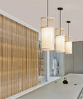 YAXDQUW Modern Style Bamboo Pendant Light Handcrafted Hanging Ceiling Lamp Adjustable Suspension Chandelier E27 Base in dining room.