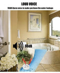 Water Leak Alarm Sensor Battery Operated 90dB Leak Detector in a bathroom by a bathtub, showcasing its loud alert system.