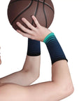 Person wearing Mens Sports Wrist Guard For Weightlifting And Gym Workouts Durable Nylon Breathable Wristband holding a basketball