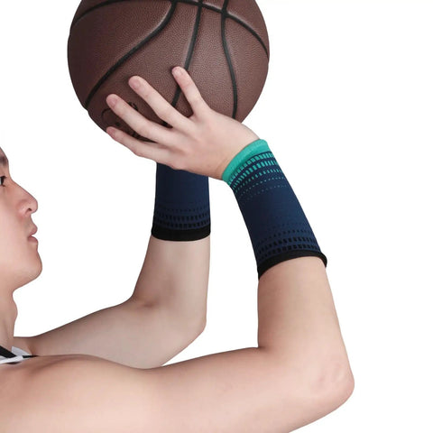 Person wearing Mens Sports Wrist Guard For Weightlifting And Gym Workouts Durable Nylon Breathable Wristband holding a basketball