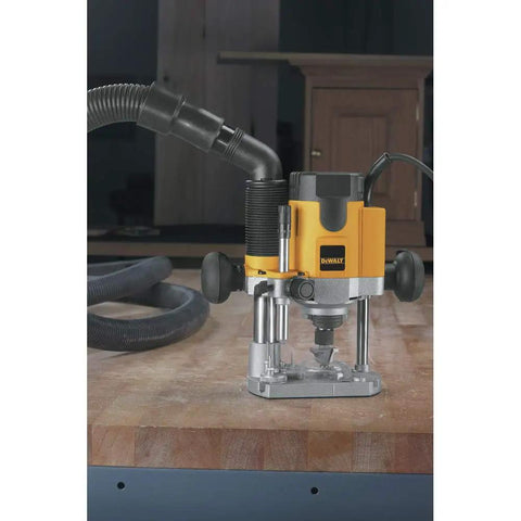 Pro Grade Workhorse Two Horsepower Plunge Router With Slick Ten Amp Electronic Variable Speed Motor on workbench.