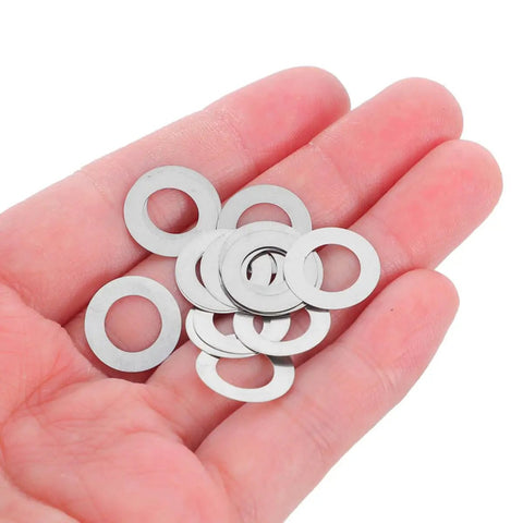 Stainless Steel Door Handle Washers and Spindle Repair Kit 100 Pcs Flat Thin Shims 8x12x0.1mm Door Knob Spacers in hand