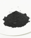 Engine Gearbox Solid Lubricant With 99.9 Percent WS2 Tungsten Disulfide One Micron Particles black powder on white surface