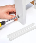 White Plastic Drawer Slides Full Extension Kit for stable smooth gliding in cabinets being installed with screwdriver