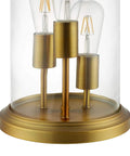 Close-up of Vintage Brass Glass Cloche End Table Lamp With Industrial Modern Vibe, highlighting brass base and three sockets.