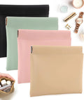 Four Pack Small Makeup Bags For Purse And Travel, Mini Portable Cosmetic Bags For Women, Coin Purse Lipstick Organizer, Travel Kit Storage Pouches In Morandi Tones For Everyday Grab And Go shown in black, light blue, pink, and beige colors with suede interiors.