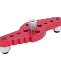 Premium Aluminum Self Centering Dowel Jig Kit Featuring Stainless Guiding Rings, red metal precision tool for alignments.