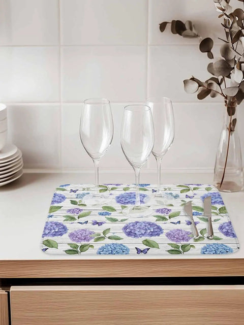 Two Pack Kitchen Drying Mats Set with floral pattern and glasses on countertop
