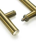18 Inch Solid Stainless Steel Door Pull Handle Satin Gold Finish Built To Last Heavy Duty Commercial Grade 304 Stainless Barn Glass Pull Chamfered Edges For Safe Easy Opening close-up with mounting hardware