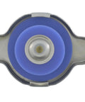 Heavy Duty 16 Psi Radiator Cap With Integrated Pressure Relief Valve top view showing blue seal and metal rim for Honda Hyundai Kia Nissan.