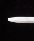 Ceramic tip of Top Shelf Ceramic Adjustment Driver For Electronics And Trimmers, 0.4x0.9mm for precise adjustments.