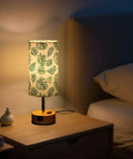 Palm Leaves Watercolor Bedside Table Lamp With 3-Way Dimming And Touch Control, Built-In Charging Station on nightstand