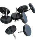 Eight Piece Round Black PTFE Furniture Sliders With Nonslip Rubber Grip Three Quarter Inch Glides For Heavy Duty Chairs Wooden Floors Smooth As Butter Pro Upgrade, shown from above with steel nails.